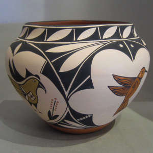 Birds and geometric designs on a polychrome jar