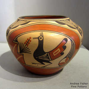 Bird, rainbow, yucca and geometric design on a polychrome jar