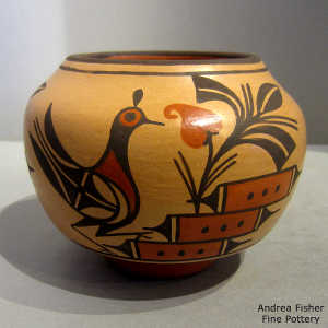 Bird, yucca and geometric design on a polychrome jar