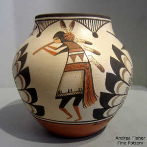 Dancer, bird, feather and geometric design on a polychrome jar