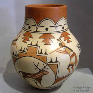 Dancer, deer, heart line, kiva step and geometric design on a polychrome jar