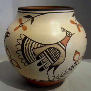 Bird and floral design on a polychrome jar