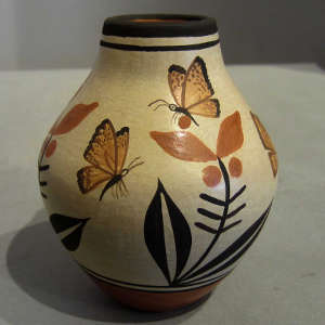 Traditional designs on a polychrome pot
