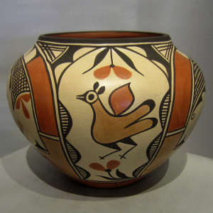 Traditional polychrome designs on a pot