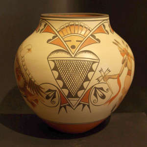 Eagle, dancer, sun-face katsina and geometric design on a polychrome jar