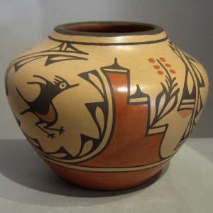 Roadrunner, floral and geometric designs on a polychrome jar