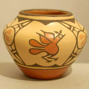 Roadrunner and geometric design on a small polychrome storage jar