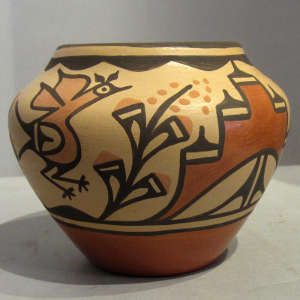 Roadrunner, corn and geometric designs on a polychrome jar