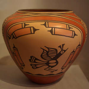 Roadrunner, rainbow and geometric designs on a polychrome jar