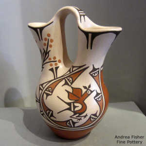 Bird, yucca and geometric design on a polychrome wedding vase