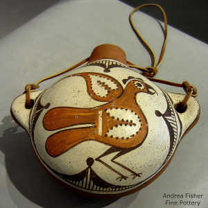 Bird and geometric design on a polychrome canteen