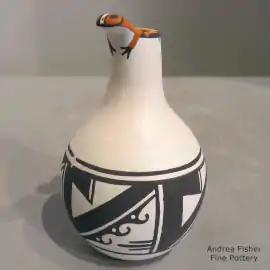 Frog and geometric design on a polychrome vase