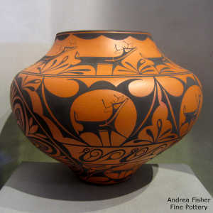 Rosette, deer, heart line and geometric design on a polychrome jar