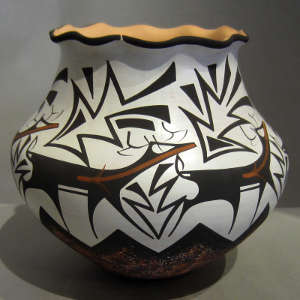 Deer and heart line design on a white pot