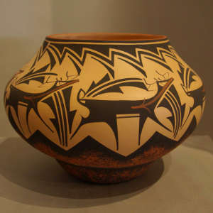 Deer heart line and geometric design on a polychrome pot