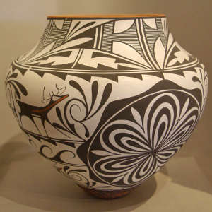 Deer heart line and geometric design on a polychrome pot