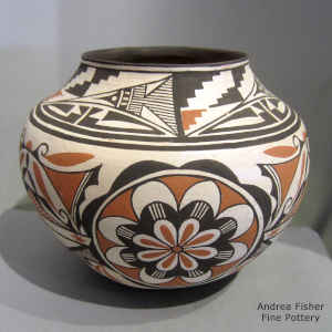 Rosette and geometric design on a polychrome jar