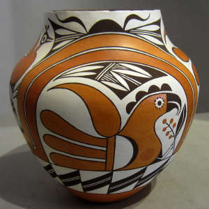 Bird, floral, geometric and rainbow designs on a polychrome jar