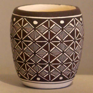 Geometric design on a black and white jar