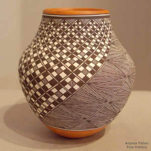 Swirl geometric design on a polychrome jar