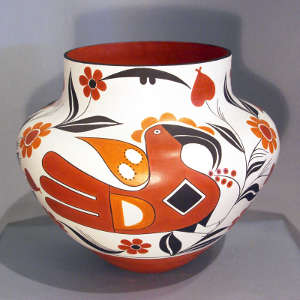 Parrot, floral and geometric design on a polychrome storage jar