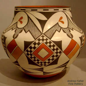 Fine line, medallion and geometric design on a polychrome jar