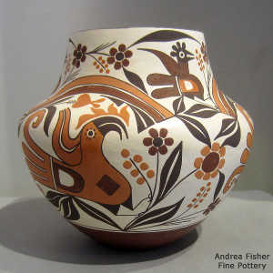 Floral, rainbow, parrot and geometric design on a polychrome jar