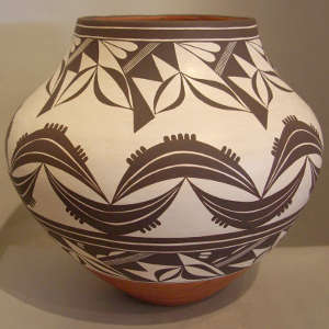 Black and white geometric design on a polychrome jar