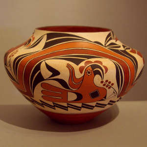 Parrot, rainbow and geometric design on a polychrome jar