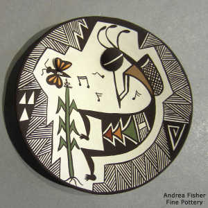 Corn plant, kokopelli, butterfly and geometric design on a polychrome plate