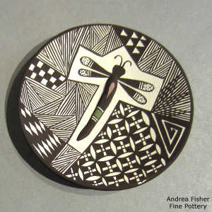 Dragonfly and geometric design on a polychrome plate