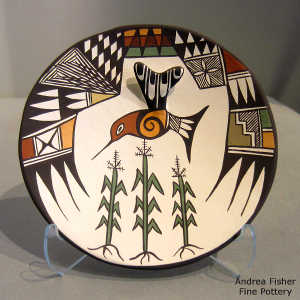 Hummingbird, corn and geometric design on a polychrome plate