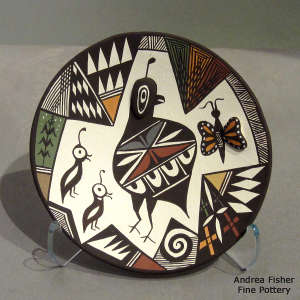 Butterfly, Mimbres quail and geometric design on a polychrome plate