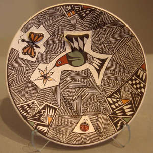 Insect, hummingbird, Mimbres and geometric design on a polychrome plate