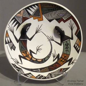 Mimbres lizard, fine line and geometric design on a polychrome plate