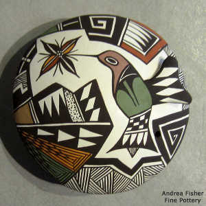 Hummingbird, flower and geometric design on a polychrome seed pot