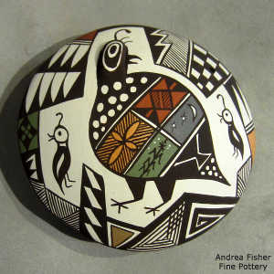 Mimbres quail and geometric design on a polychrome seed pot