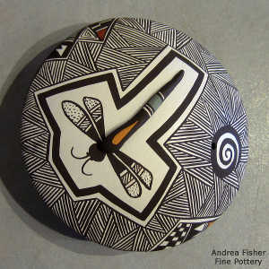 Fine line, spiral, dragonly and geometric design on a polychrome seed pot