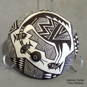 Cloudeater, fish and geometric design on a black and white seed pot