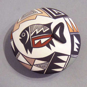 Fish and geometric design on a polychrome seed pot