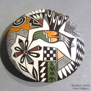 Hummingbird, flower and geometric design on a polychrome seed pot