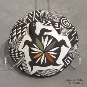 Turtle and geometric design on a polychrome seed pot