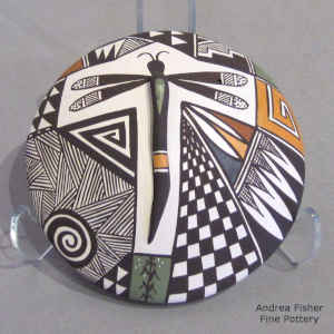 Dragonfly, checkerboard, fine line and geometric design on a polychrome seed pot