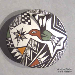 Hummingbird, flower, lightniing, rain and geometric design on a polychrome seed pot