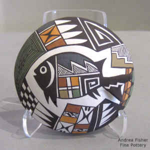 Mimbres-style fish, lady bug and geometric design on a polychhrome seed pot