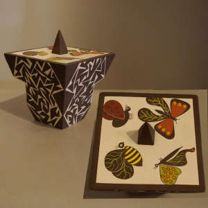 Click for a larger version Insect and geometric design on a square, lidded polychrome jar