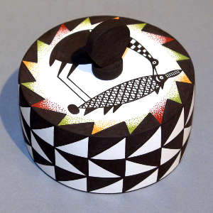 Cloudeater, fish and geometric design on a polychrome lidded round box