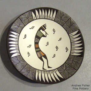 Rain, feather, kokopelli and geometric design on a polychrome plate