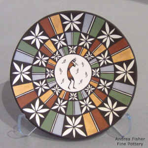 Kokopelli and geometric design on a polychrome plate