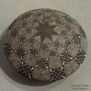Fine line and geometric design on a black and white seedpot